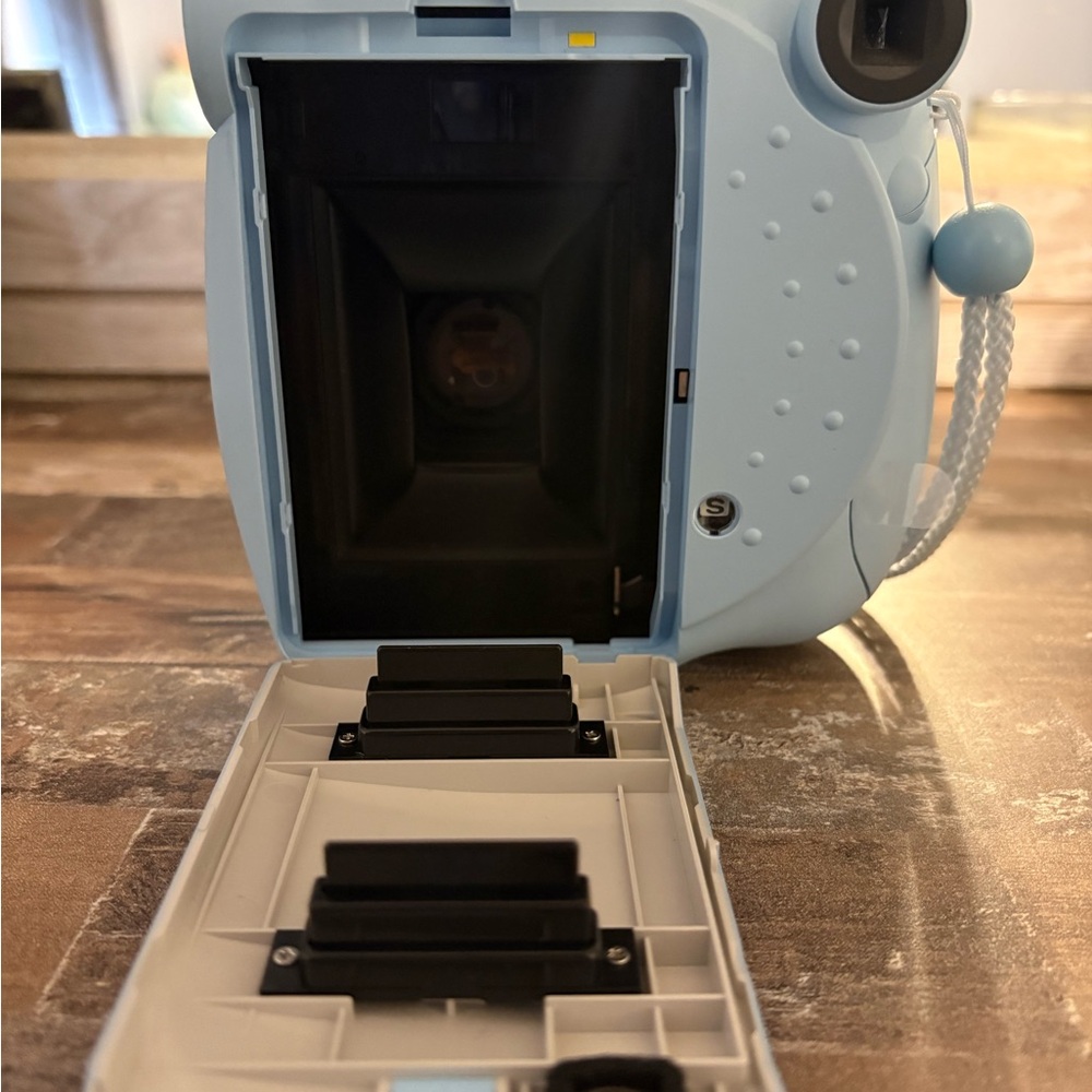 Light Blue Polaroid Camera